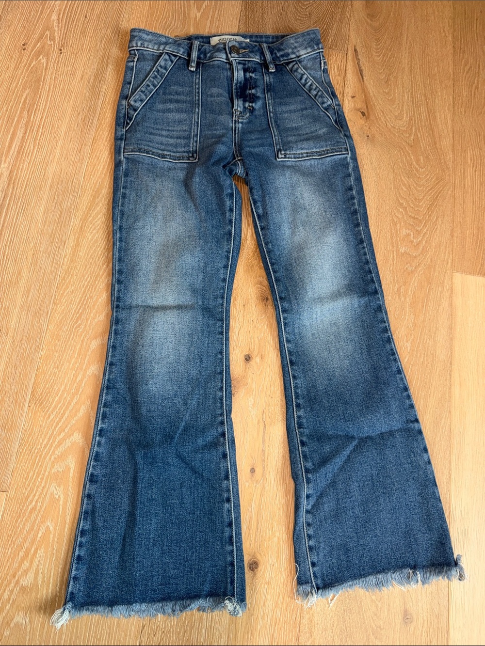 Hidden Jeans High-Rise Blue Flare Jeans with Raw Hem